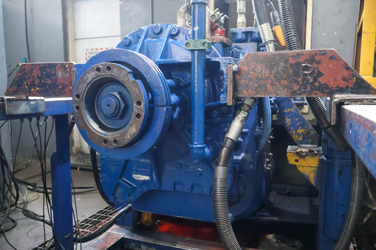 Blue Industrial Machinery and Transmission Assembly.