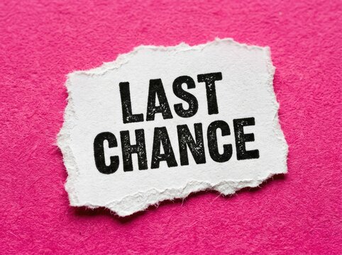 Last Chance text on torn white paper, pink background, representing urgency and final opportunity for marketing and promotions.