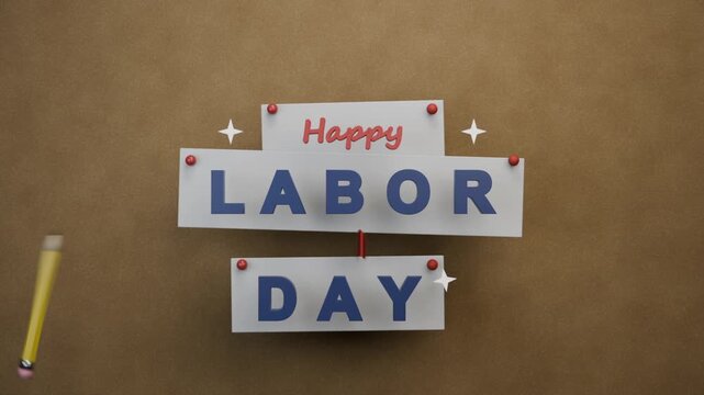 Appearing red pins sparking panels sliding on kraft, blue letters forming LABOR DAY honoring worker