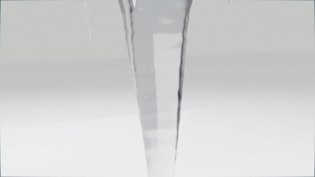Forming droplet on glass icicle, detaching from thin tip and falling past gray backdrop with specks
