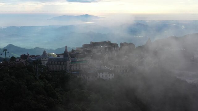 Cinematic Drone Footage of Ba Na Hills Featuring Golden Hands Bridge, Linh Ung Pagoda, Sun World French Village Castle and Mountain View Overlooking Da Nang