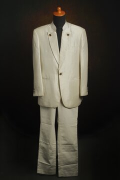 Men formal attire, suit or blazer with white trousers on display mannequin