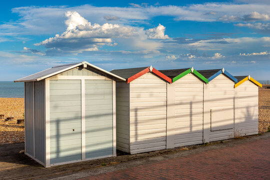 Colorful Beach Huts on Eastbourne Seafront in Eastbourne, East Sussex, England, UK