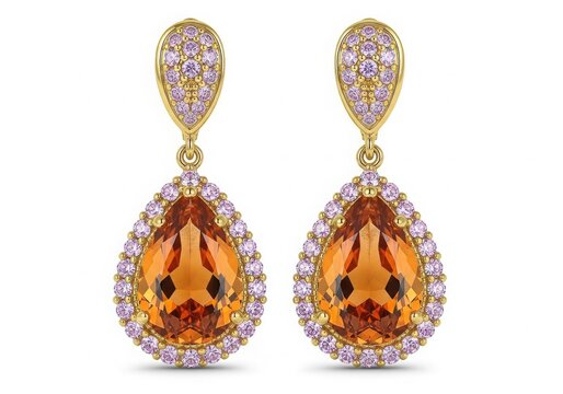 Elaborate teardrop earrings with floral and gem details isolated on white background
