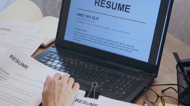 Career Assistant Reviewing and Editing Resume Document