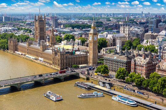 Panoramic aerial view of Palace of Westminster, Westminster Bridge with Big Ben clock tower and River Thames, London, England, UK