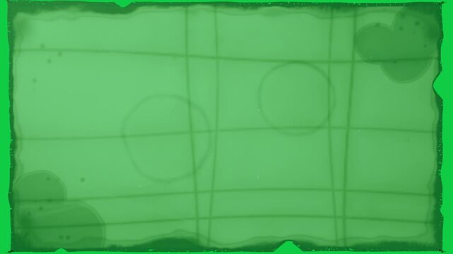 Film strip entering left causing sepia frame sliding, stains appearing, revealing clear backdrop