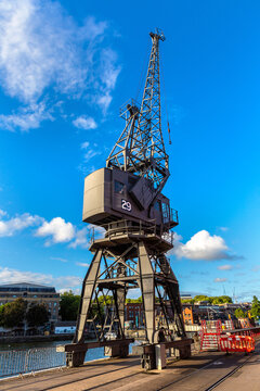 Historic harbour cargo cranes on Bristol Harbour in Bristol, England, UK