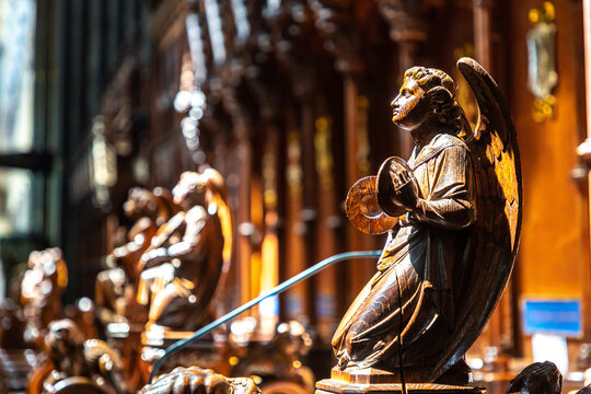 Carved Wooden Angel Musician inside Salisbury Cathedral in Salisbury, Wiltshire, England, UK