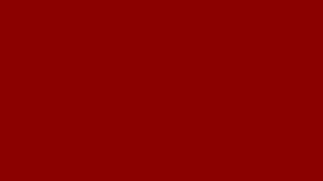 A deep, rich, and textured crimson red background with subtle variations in shade and light.