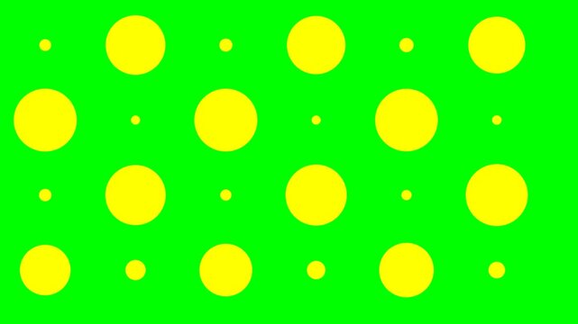 Bright yellow circles of varying sizes arranged in a grid pattern on a vibrant green background.
