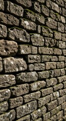 Fototapeta premium Close up view of old weathered stone brick wall texture.