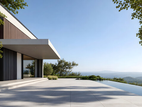 Modern Luxury House on a Sunny Hilltop Road with Contemporary Architecture, Large Windows and Beautiful Sky