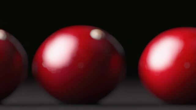 Row of red eggs sitting next to each other