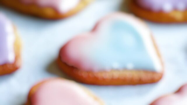 A close-up view of heart-shaped cookies with intricate designs