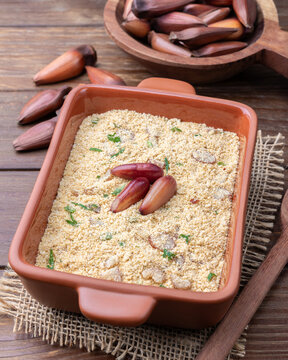 Fafora de pinh&atilde;o, typical brazilian sidedish on a bowl over wooden table
