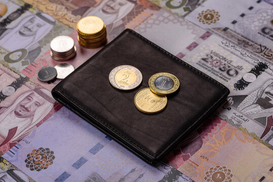 Saudi Arabia paper money, riyal banknotes and coins as currency for exchange. Saudi Arabia money