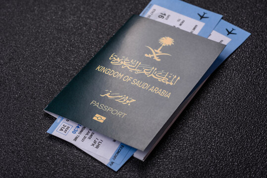 Saudi Arabia passport or id document with tickets for flight, travel. Saudi Arabia passport