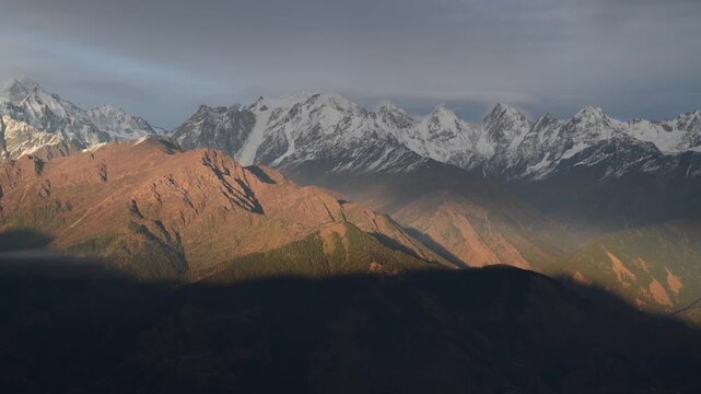 Panoramic Sunlight and Shadows over the Panchachuli Range in Uttarakhand