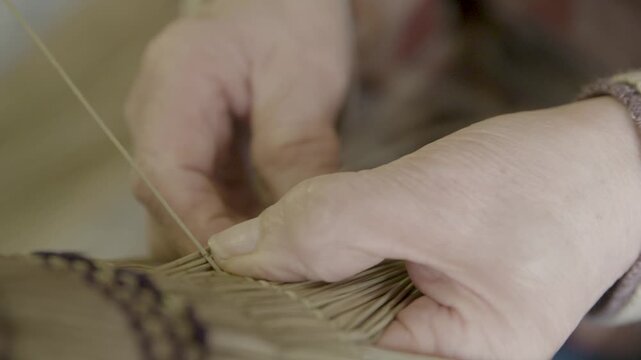 Hands Crafting Traditional Bon Odori Hat in Ugo Town Akita Japan Close