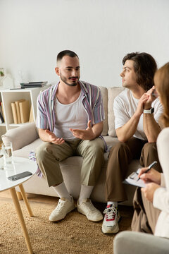 Couple shares their feelings during a therapy session with a supportive psychologist