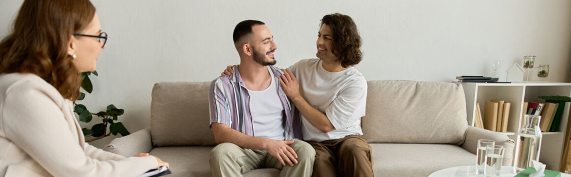 Loving couple shares heartfelt moments during therapy session with supportive psychologist