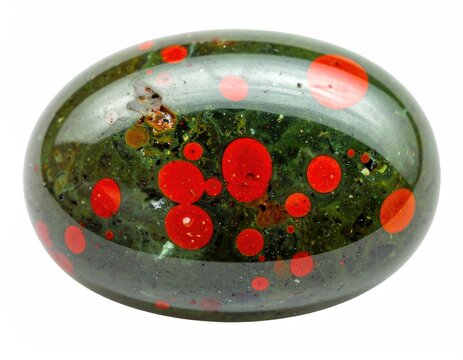 Oval polished deep green stone with vibrant red circular inclusions