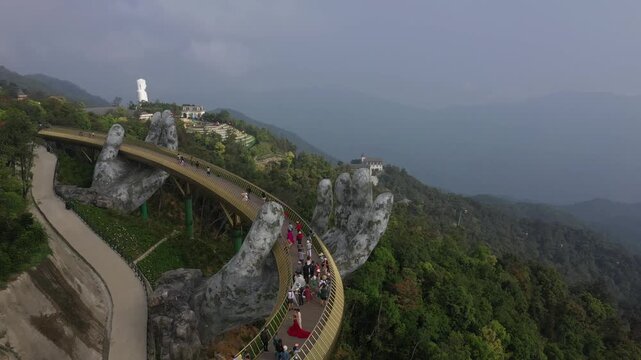 B&agrave; N&agrave; Hills Resort Aerial View: Golden Bridge, Giant Buddha Statue, French Village & Panoramic Da Nang Cityscape, Vietnam