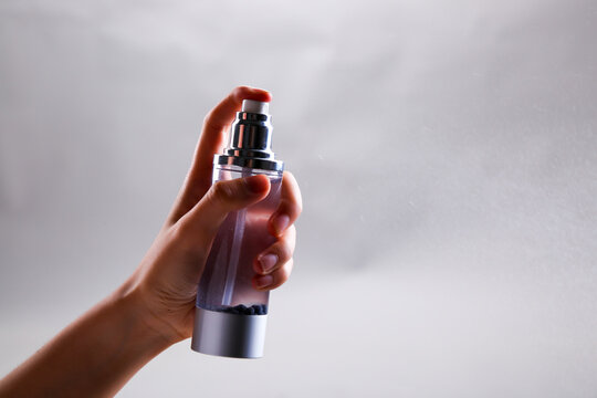 Spray water with a spray bottle
