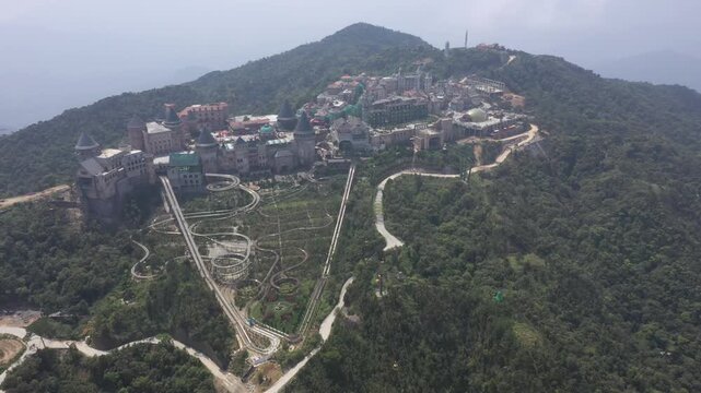 B&agrave; N&agrave; Hills Resort Aerial View: Golden Bridge, Giant Buddha Statue, French Village & Panoramic Da Nang Cityscape, Vietnam