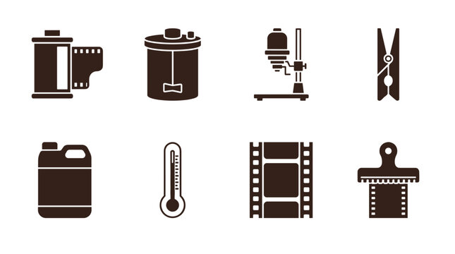 Dark brown film photography darkroom silhouette icon set, film roll, enlarger, thermometer and developing tools isolated on white background