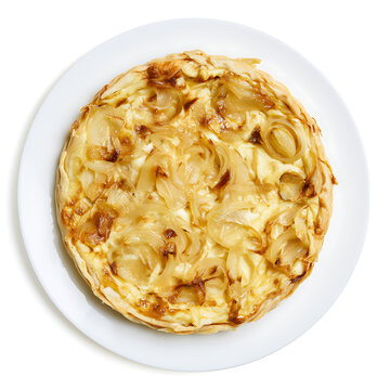 Homemade savory French onion tart on white plate