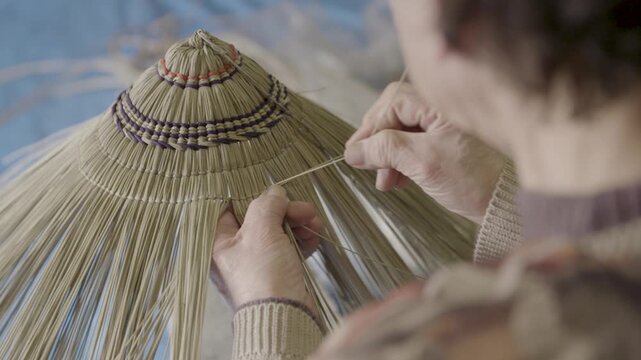 Hands Weaving Traditional Bon Odori Hat in Ugo Town Akita Japan Close 
