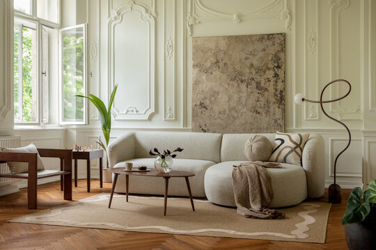 Elegant and Spacious Living Room with Contemporary Furniture and Natural Light