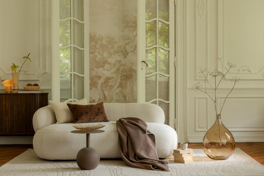 Elegant and Cozy Living Room Interior with Modern Sofa and Warm Natural Light, Perfect for Home Decor Concepts