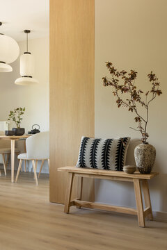 Minimalist Home Interior with Wooden Bench and Decorative Elements, Scandinavian Design with Warm Natural Light