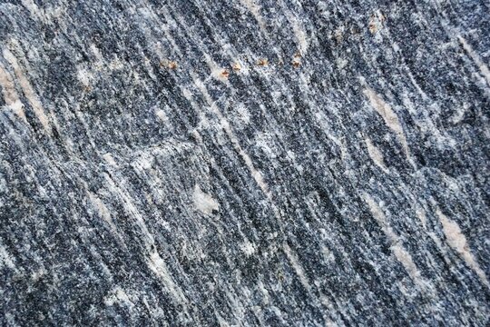 Raw natural Grantite rock closeup, textural background