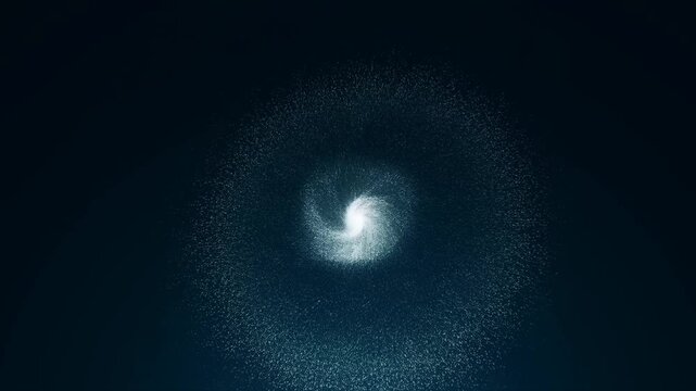 Slow motion aerial zoom of particles cloud forming rotating spiral vortex over dark abstract space background