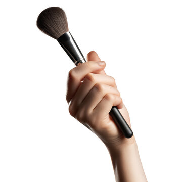 Woman holding makeup brush with silver handle isolated on transparent background isolated on a transparent background