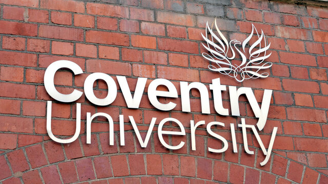 Coventry, England, UK - 20 July 2026: Coventry University, sign, logo, metal lettering, red brick wall, educational institution in England, UK