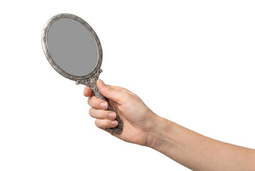 A person holding an ornate vintage silver handheld mirror © Md