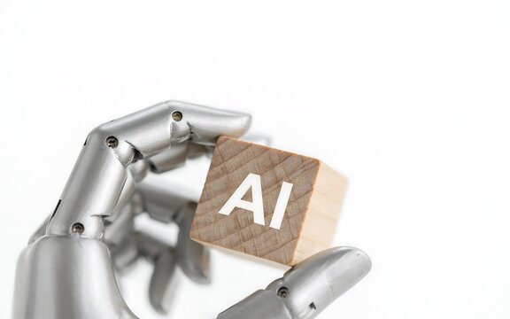 Robotic hand holding AI wooden block. Futuristic machine learning and automation concept.