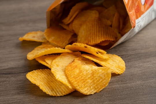 Potato chips , delicious BBQ seasoning spicy for crips, thin slice deep fried snack fast food.