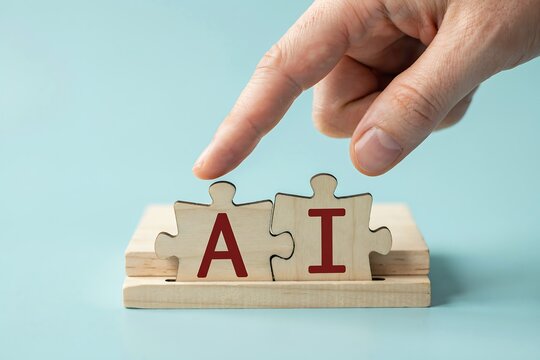 Hand connecting AI puzzle pieces. Artificial intelligence concept with wooden jigsaw blocks.