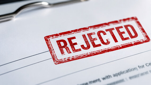 Document Paper with Red Rejected Rubber Stamp Impression on Clipboard, Business Application Denied, Visa Rejection, Loan Refusal, Declined Form, and Paperwork Failure Concept