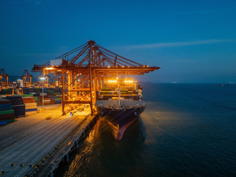 Brightly Lit Seaport After Dark
