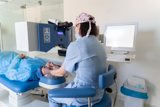 Surgeon Performs Eye Laser Procedure in Clinic Room