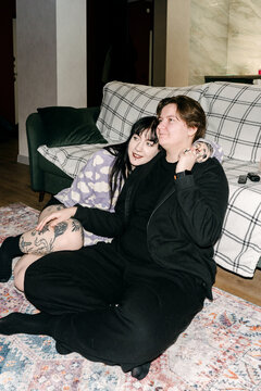 A couple enjoys spending time together in their house.