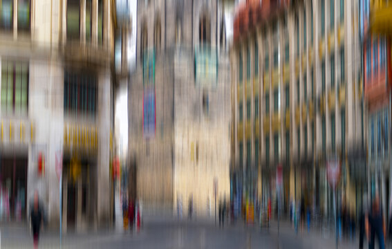 abstract urban scenery in Halle (Saale), Kleinschmieden Street, view of the Red Tower, Saxony-Anhalt, Germany, wallpaper decor with motion blur icm style