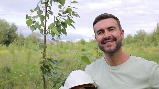 Landowner smiling next to Poplar Tree on His Plantation 